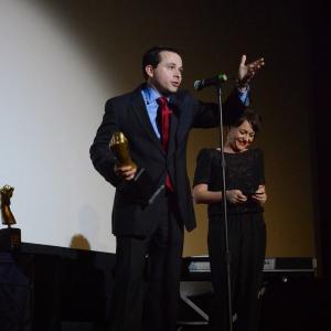 Accepting the Best Whactor Award at the 2014 TOSCAR Awards at the Egyptian Theatre in Hollywood.