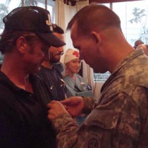 sean penn- oscar gubernati alison thompson receiving medals of excellence from LTC Foster and 82nd airborne haiti 2010