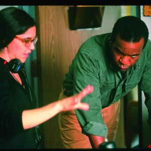 Still of David Alan Grier and Nicole Kassell in The Woodsman (2004)