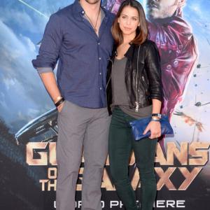 Travis Willingham (L) and Laura Bailey attend the premiere of Marvel's 