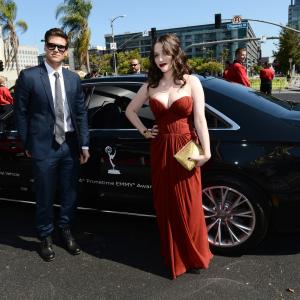 Kat Dennings and Nick Zano at event of The 64th Primetime Emmy Awards (2012)