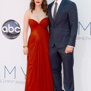 Kat Dennings and Nick Zano at event of The 64th Primetime Emmy Awards (2012)