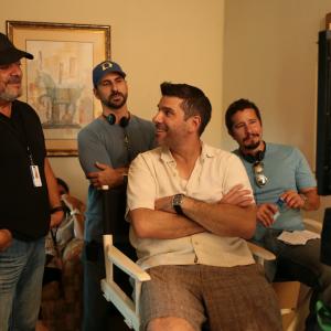 Joe Menendez at the monitor with Jon Molerio Oscar Torre and Alfonso Rodriguez on the set of LADRONES