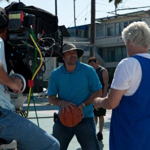 Joe Menendez gives Bruce Davison basketball pointers on the set of 3 Holiday Tails in 2011