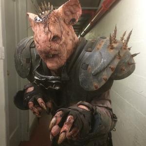 The Rat Patrol: Armageddon. Rat makeup, fingers, teeth and tail designed, sculpted, pre-painted, applied, and detailed by Richard Redlefsen. Makeup embellishments, gauges, bullet head piece, tattoos, and goggles also by Richard Redlefsen.