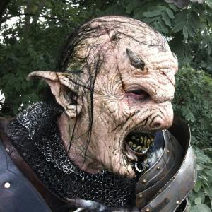 Orc makeup. Appliances and teeth sculpted, molded, applied and painted by Richard Redlefsen. Appliances produced by Vincent Van Dyke