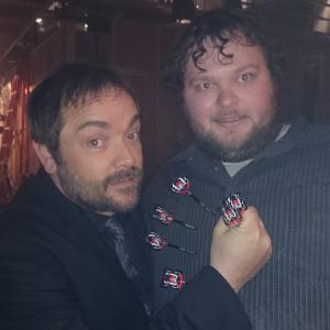 Playing a game of darts with Mark Sheppard on the set of 
