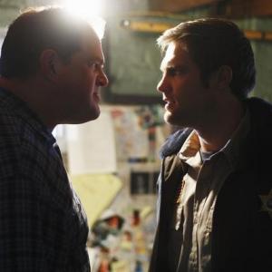 Still of Abraham Benrubi and Geoff Stults in Happy Town (2010)