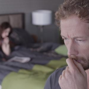 Still of Emily Hampshire and Kris Holden-Ried in The Returned (2013)