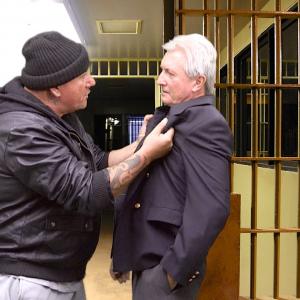Arrested gang leader Tautaru (Walter Walsh) turns on seedy gang lawyer Lamonge (Warren Philp) when his bail is refused.