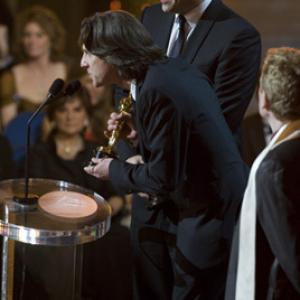James Marsh and Simon Chinn accept the Oscar® for Best Documentary Feature for 