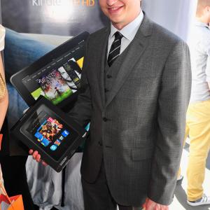 Benh Zeitlin poses in the Kindle Fire HD and IMDb Green Room during the 2013 Film Independent Spirit Awards at Santa Monica Beach on February 23, 2013 in Santa Monica, California.