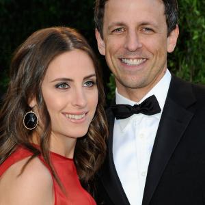 Seth Meyers (R) and Alexi Ashe arrives at the 2013 Vanity Fair Oscar Party hosted by Graydon Carter at Sunset Tower on February 24, 2013 in West Hollywood, California.