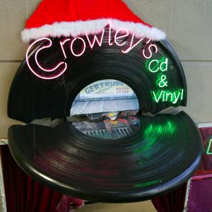 Crowleys CD  Vinyl from Its A Mall World Designed by B McBrien hand carved by David French