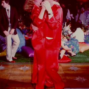 1981, Playboy Mansion (West) Pajama Party. L-R: Hugh Hefner bodyguard Larry Montz, July 1977 Playboy Playmate Sondra Theodore, Hugh Hefner.