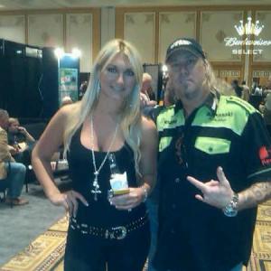 Rich Hopkins hanging out with Brooke Hogan at an Industry Trade Show