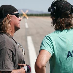 Stunt Coordinator Rich Hopkins setting up the next Motorcycle Stunt with Director Paul Boyd on the Runway of Boulder Airport