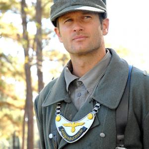 Johann Urb as Feldgendarm Hans Graf in the World War II film The Last Rescue.
