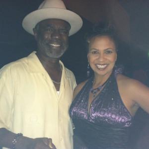 With Glynn Turman at a charity event in 2013