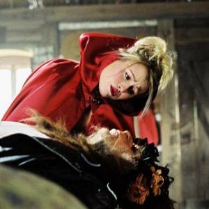 Mitsou Gelinas as Little Red Riding Hood and Marc Labrèche as The Big Bad Wolf in the Denise Filiatrault film ALICE'S ODYSSEY