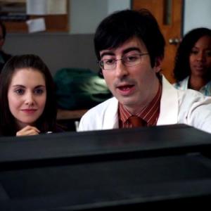 Still of John Oliver and Alison Brie in Community 2009