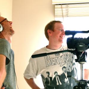 Robert Murphy and Alex Holdridge filming the performance of Twink Caplan in In Search of a Midnight Kiss