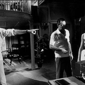 573472 Paris When It Sizzles Audrey Hepburn William Holden and director Richard Quine on set