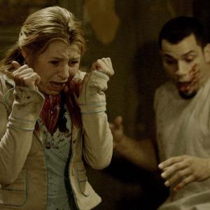 Still of Beverley Mitchell and Franky G in Saw II 2005