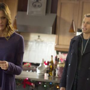 Still of Mark Lutz and Tricia Helfer in Finding Christmas 2013