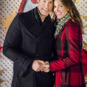 Still of Mark Lutz and Tricia Helfer in Finding Christmas 2013