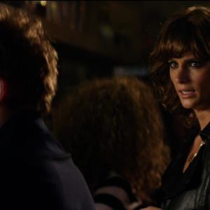 Still of Rupert Grint and Stana Katic in CBGB (2013)