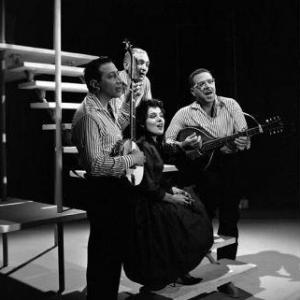 Sid Dolgay, Jerry Goodis, Simone Johnston, Jerry Gray and The Travellers in The Travellers: This Land Is Your Land (2001)