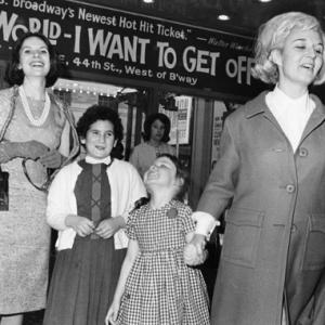 Sybil Burton and children Kate left and Jessica beam as they leave matinee performance of the musical Oliver at the Imperial Theatre in New York on May 4th Sybils husband actor Richard has been the constant companion of actress Elizabeth Taylor for the past year or so 05041963