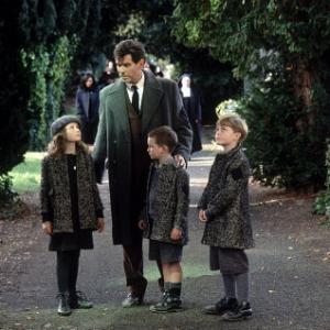 Desmond Doyle (PIERCE BROSNAN) talks to his children (left to right) Evelyn (SOPHIE VAVASSEUR), Dermot (NIALL BEAGAN), and Maurice (HUGH MacDONAGH)