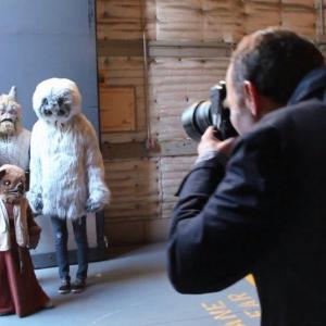 Behind the Scenes on Volkswagens 2012 Superbowl commercial featuring Darth Vader and the aliens of the Star Wars Cantina Creature creator Tom Spina poses with the creatures from Table 1 with actress Brianna Gardner as Muftak R
