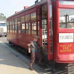 Gattlin on trolley car on the set of The Changeling.