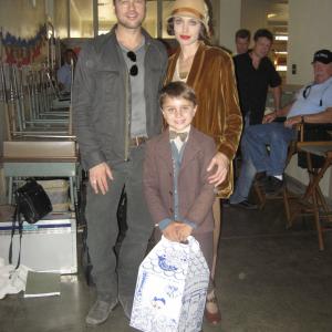 Gattlin with Angelina Jolie and Brad Pitt on the set of the Changeling.