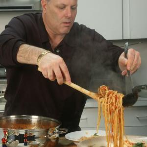 Frankie the Butcher in action cooking a Classic dish Spaghetti and Meatballs on his show Titled Whats for Dinner with Frankie the Butcher on the wwwitalianamericannetworkcom under food and recipes