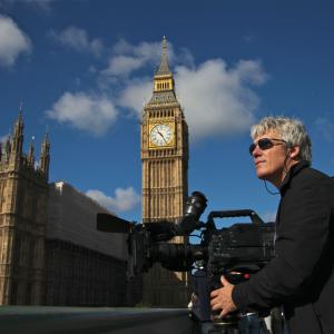 Director Peter von Puttkamer lines up a shot in London, England, for: 