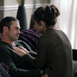 Still of Sarah Shahi and Taylor Kinney in Chicago Fire 2012