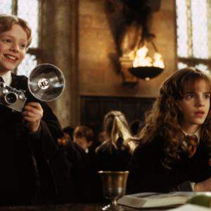 Still of Emma Watson and Hugh Mitchell in Haris Poteris ir paslapciu kambarys 2002