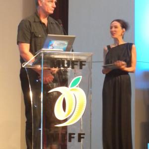 Defne Halman presents John Sayles with a Lifetime Achievement award at the 3rd Malatya Film Festival