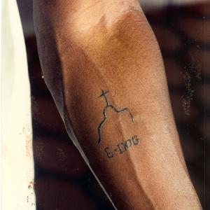 GDog tattoo on Dennis Haysbert as Breedan in Heat Tattoo designed and applied by Ken Diaz