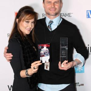 Standing with Director Mark Kochanowiczawarded Best Director for Assumption of Risknominated Best PictureWinter Film Awards NY 2015Patricia Mizen Female LeadDarci Bettencort