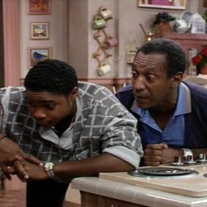 Still of Bill Cosby and MalcolmJamal Warner in The Cosby Show 1984