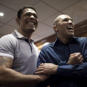 Brazilian Mixed Martial Arts (MMA) legend Royce Gracie, right, jokes with Brazilian MMA fighter Minotauro Nogueira share a light moment before the start of a news conference in Rio de Janeiro, Brazil, Thursday Aug. 25, 2011. The MMA organization, the Ulti