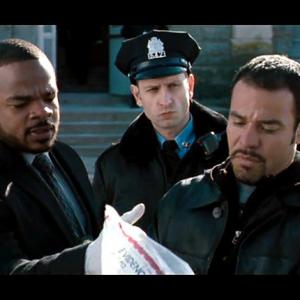 LAW ABIDING CITIZEN Movie Still - Director F. Gary Gray, Damien Colletti (as Officer Bruno), and Michael Irby (as Detective Garza).