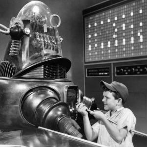 Still of Richard Eyer and Robby the Robot in The Invisible Boy 1957