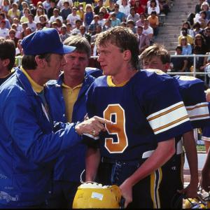 Still of Anthony Michael Hall and Paul Gleason in Johnny Be Good (1988)