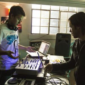 Devon Werkhiser becoming a DJ in the movie SUNDOWN. Director Fernando Lebrija besides him.